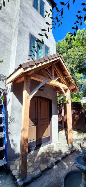 Raw timber portico before staining